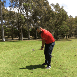 Peter Lamaris Golfing Professional chipping a golf ball