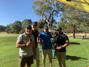 Golfers enjoying some drinks on the course